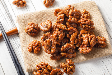 Walnuts on a white board