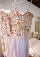 wedding dress in the bedroom