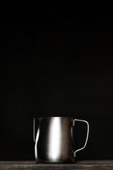 dishes for barista for making coffee drinks on a black background