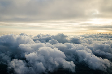 Naklejka na ściany i meble Flying above the clouds