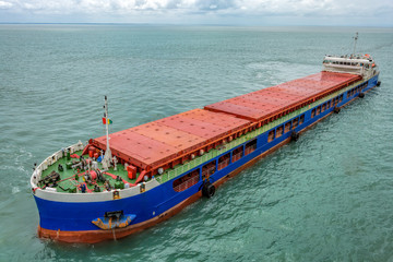 Small multipurpose dry cargo vessel also known locally as barges, used to feed the mother vessels...
