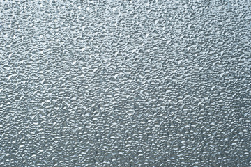 Blue window texture. View of a glass window in macro