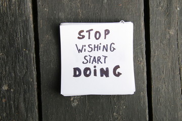 Stop dreaming start doing concept. Inspirational quote, motivation.