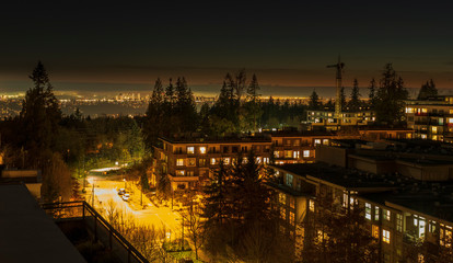 Fototapeta na wymiar nightfall over a residential area on Burnaby Mountain, BC