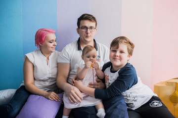 Young parents with daughter and son