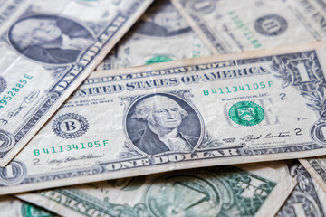 Fototapeta na wymiar Closeup US 1 Dollar Currency Bank Notes. selective focus