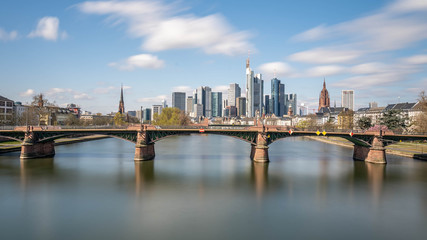 Fototapeta na wymiar Frankfurt, Germany - March 31, 2020: frankfurt skyline view with ignas bubis bridge during daytime