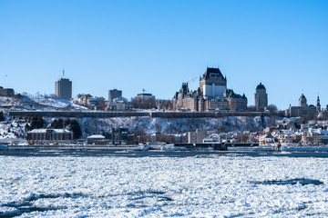 View of Quebec city from the river. River covered with ice