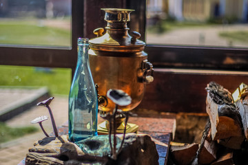 Rustic scenery samovar and bottle