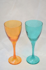 Mock up design set of elegant and traditional drink ware / drinking glass & Jar for wine or juice, colorful transparent isolated on black background 