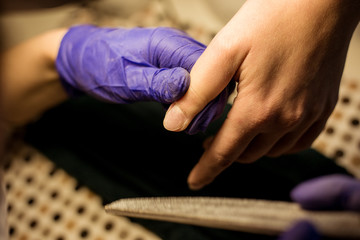 Women do manicures at home. Self-isolation manicure. Nail salon.