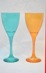 Mock up design set of elegant and traditional drink ware / drinking glass & Jar for wine or juice, colorful transparent isolated on black background 