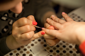 Women do manicures at home. Self-isolation manicure. Nail salon.