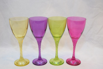 Mock up design set of elegant and traditional drink ware / drinking glass & Jar for wine or juice, colorful transparent isolated on black background 