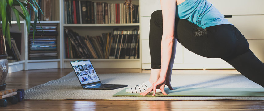 Home Workout Concept Woman In Living Room With  Laptop And Dumbells Mental Health In Quarantine