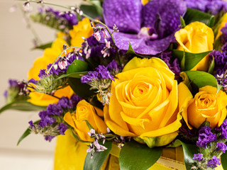 Bright fresh purple and yellow flowers. Decorative composition of a greeting card for a birthday holiday. Copy space.