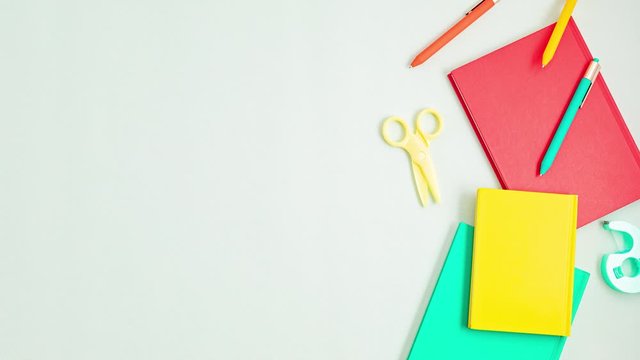 Stop motion animation with school supplies. Back to school, education, childhood, primary school concept. Top view