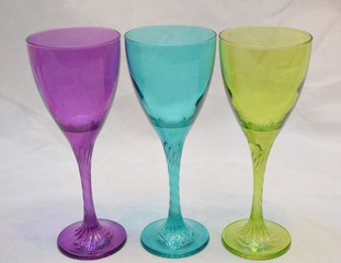 Mock up design set of elegant and traditional drink ware / drinking glass & Jar for wine or juice, colorful transparent isolated on black background 