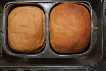 Homemade bread is baked in a bread maker