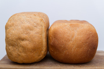 Freshly baked bread was baked at home in a bread maker