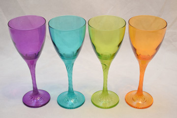 Mock up design set of elegant and traditional drink ware / drinking glass & Jar for wine or juice, colorful transparent isolated on black background 