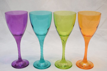 Mock up design set of elegant and traditional drink ware / drinking glass & Jar for wine or juice, colorful transparent isolated on black background 