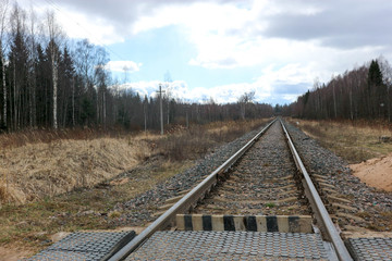 Spring view of single track railway in the distance