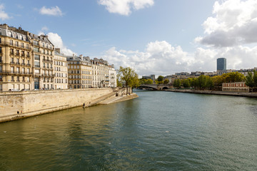 Fototapeta na wymiar Apartment buildings on the Isle St. Louis in Paris, France, along the Seine River