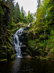 Kamienczyk mountain waterfall in early autumn