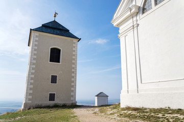 Obraz premium Nature preserve Holy Hill by Mikulov with Way of the Cross to the Pilgrimage Chapel of Saint Sebastian and Bell Tower, Moravia, Czech Republic, sunny summer day