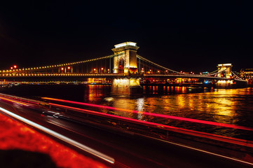 Fototapeta na wymiar Budapest by night. Bridge over the Danube River in Budapest