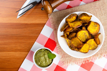 Detail of pieces of sweet potato fried in a healthy way. Top view.