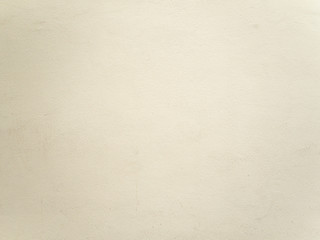 The texture of the plaster wall is beige