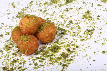 Oriental Arabic boolls sweet pastries & ramadan dessert with pistachio