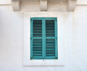 Fototapeta na wymiar Window closed shutters