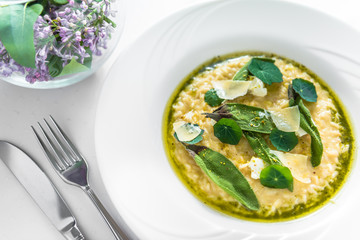 Potato risotto with goat cheese, rice, wild garlic