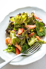 Cooked salmon salad with Norwegian salmon, strawberries