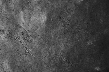Brushed brass plate background texture, metal surface with scratches and dents, selective focus