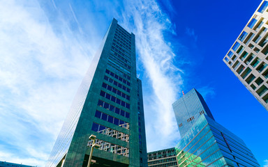 Fototapeta na wymiar Glass Business office buildings architecture in Modern City in Vienna reflex