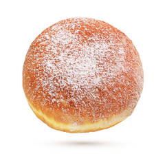 Berliner Pfannkuchen or donut with sugar powder isolated