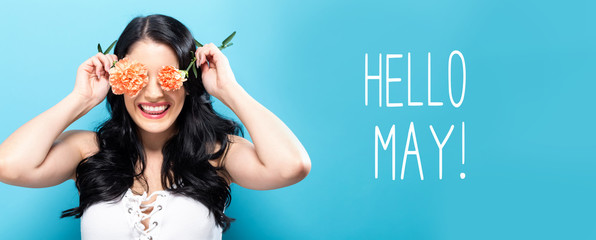 Hello May message with young woman holding carnation flowers © Tierney