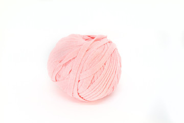 Salmon ball of wool. Isolated. Crafts and sewing. Indoor leisure. Be at home