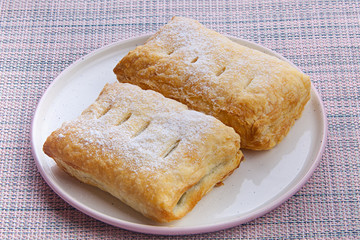 Delicious crispy bun with a plate on plate