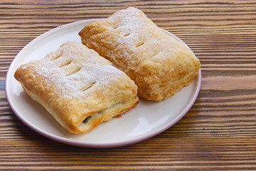 Delicious crispy bun with a plate on plate