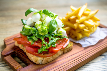 Mozzarella cheese sandwich toast and green lettuce