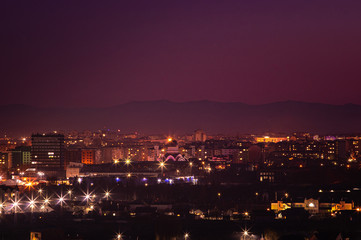 Fototapeta na wymiar Sunset over the Ukrainian city