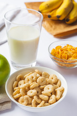 cereals with milk on white background