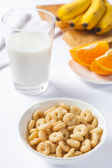 cereals with milk on white background