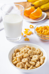 cereals with milk on white background
