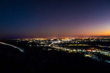 Fototapeta na wymiar Sunset over the Ukrainian city
